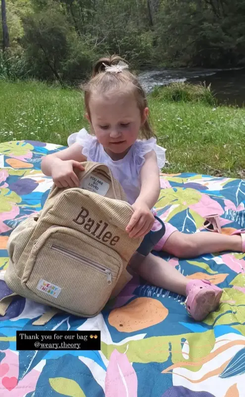 Social image of a happy Weary Theory customer with their new backpack.