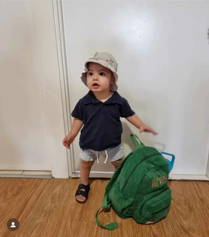 Social image of a happy Weary Theory customer with their new backpack.