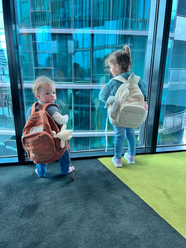 Social image of a happy Weary Theory customer with their new backpack.